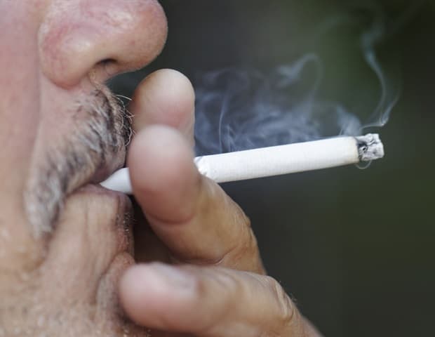 Smoking status influences Parkinson disease risk and mortality outcomes