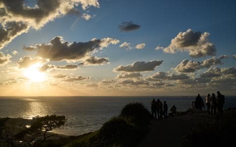 Trump says he not happy with Iran talks but will wait to see what happens in further rounds